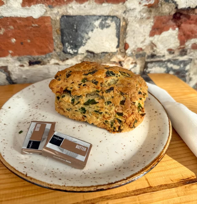 Have you tried our wild garlic & cheese scone yet?
Foraged locally and full of flavour, wild garlic is at its best right now 🌿🧄 — and it makes this scone next level.

Best enjoyed warm with a generous spread of butter 🧈… or go bold with chilli jam 🌶️ and cream cheese 🧀. 

Available in the Café now!
#stubbingscafe #stubbings #berkshire #wildgarlic #garlic #foraging #spring #berkshireforage #maidenhead #scone #cheesescone #baking